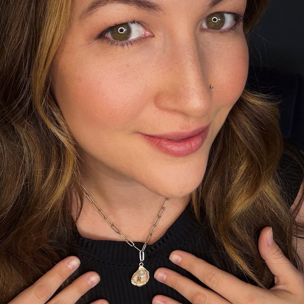 Personalized oyster pendant necklace on a stainless steel chain, custom-made in Louisiana