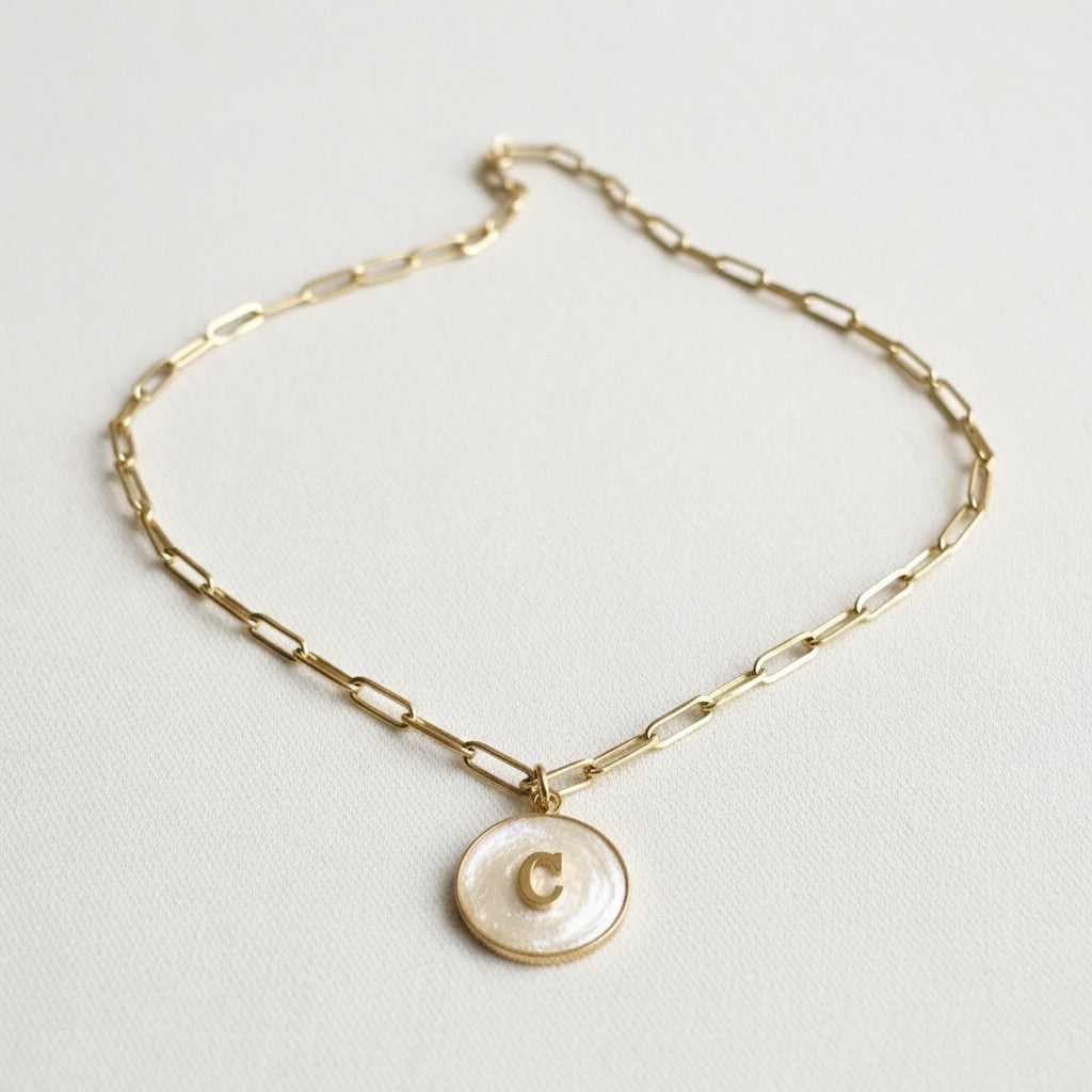 Custom initial necklace with pearl resin finish on adjustable 16 inch gold stainless steel chain