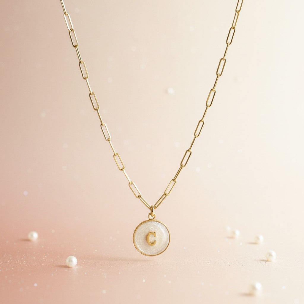 Custom pearl initial necklace in 18k PVD gold on stainless steel chain, featuring a pearl resin initial pendant